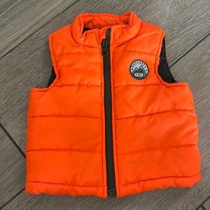 Orange puffer vest